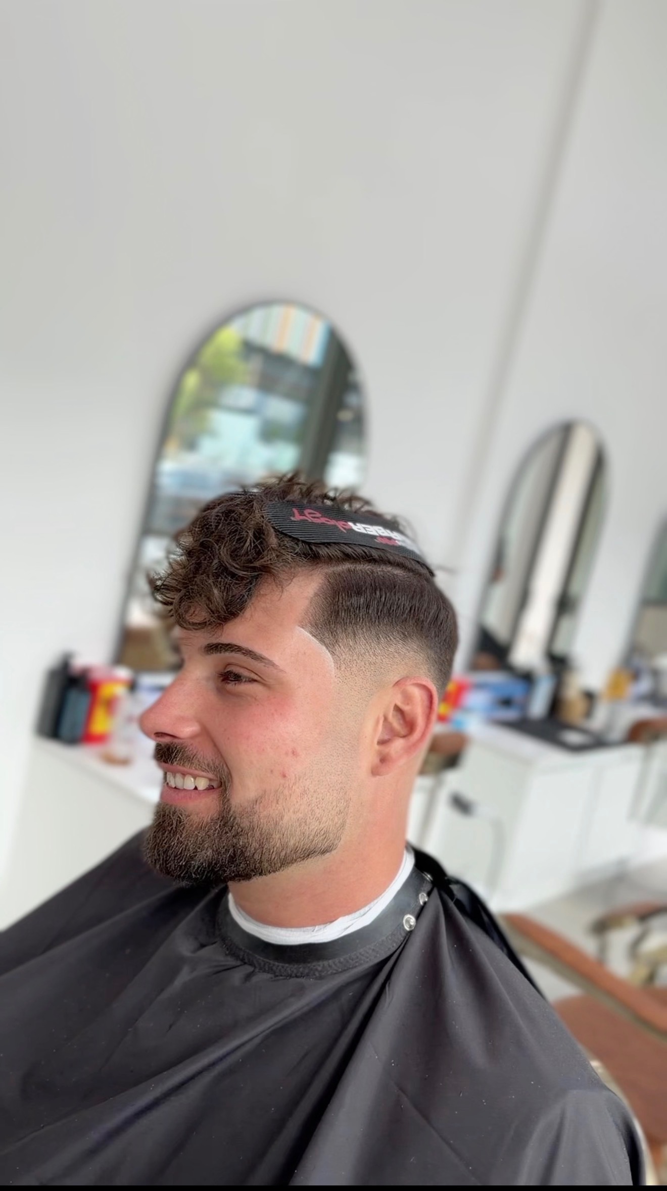 Fresh taper fade with a neatly shaped hairline