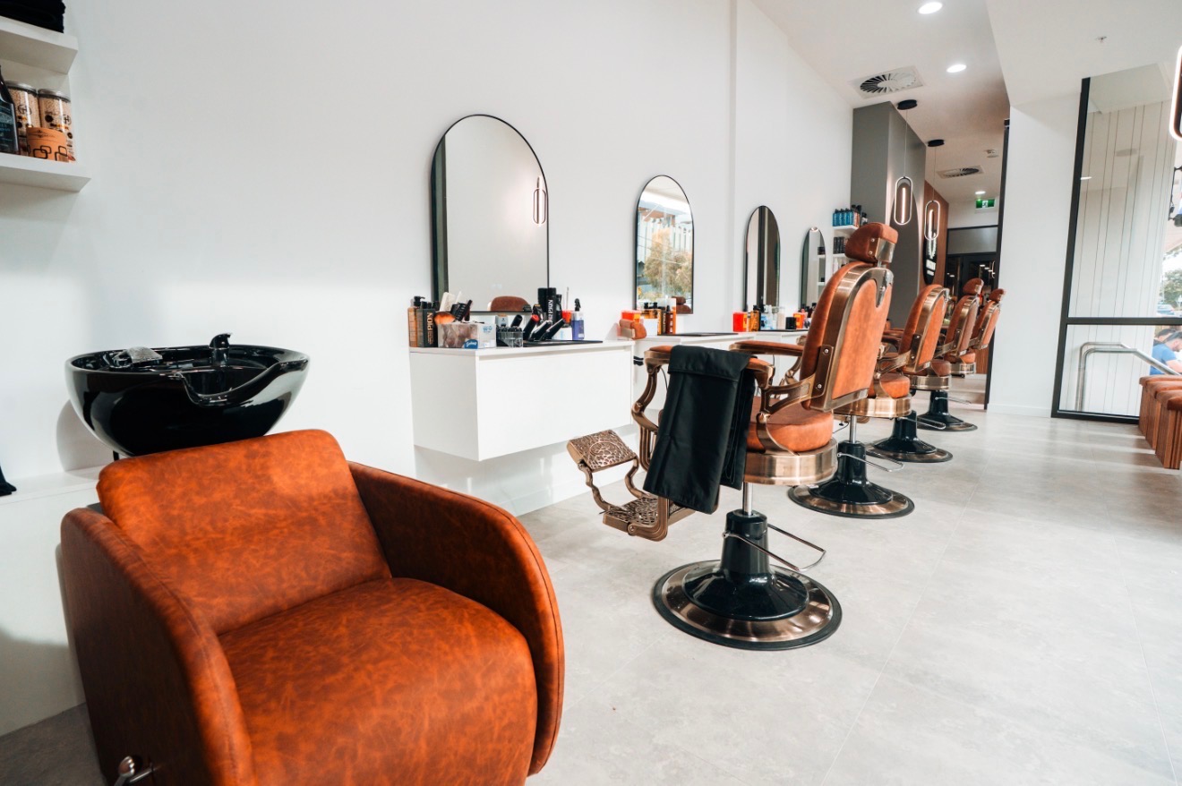 Bright Legacy Barbers interior with styling chairs and mirrors